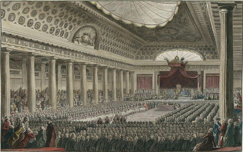 Hand-coloured 1789 engraving of the opening of the Estates General at Versailles, with deputies seated in long rows facing the king's canopied throne
